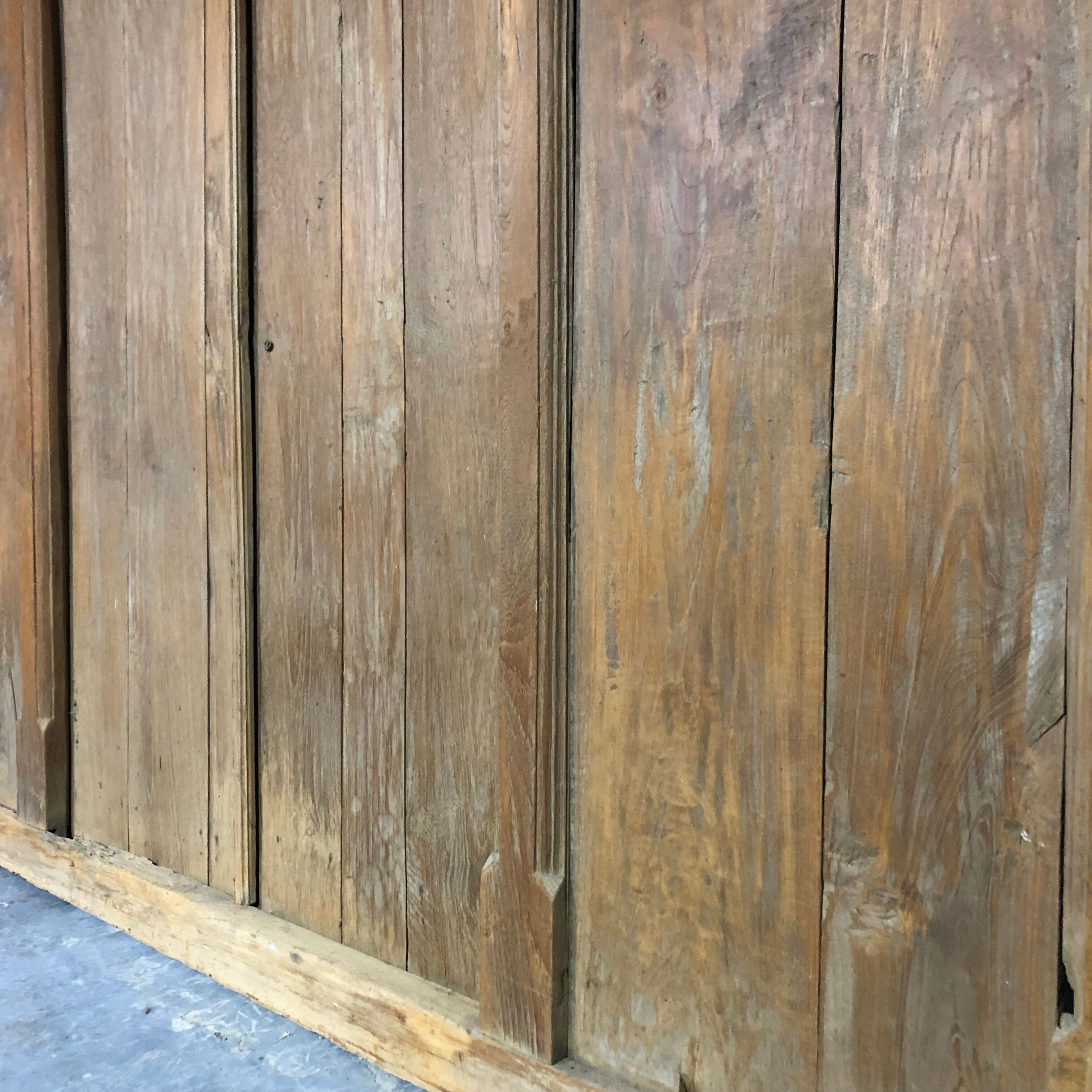 Old wooden door with its frame