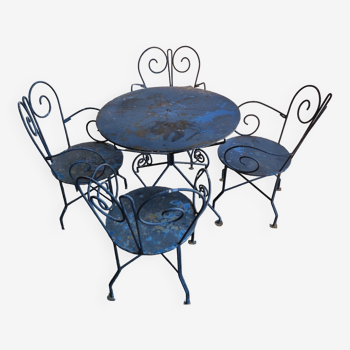 Garden set of 4 armchairs and a wrought iron table