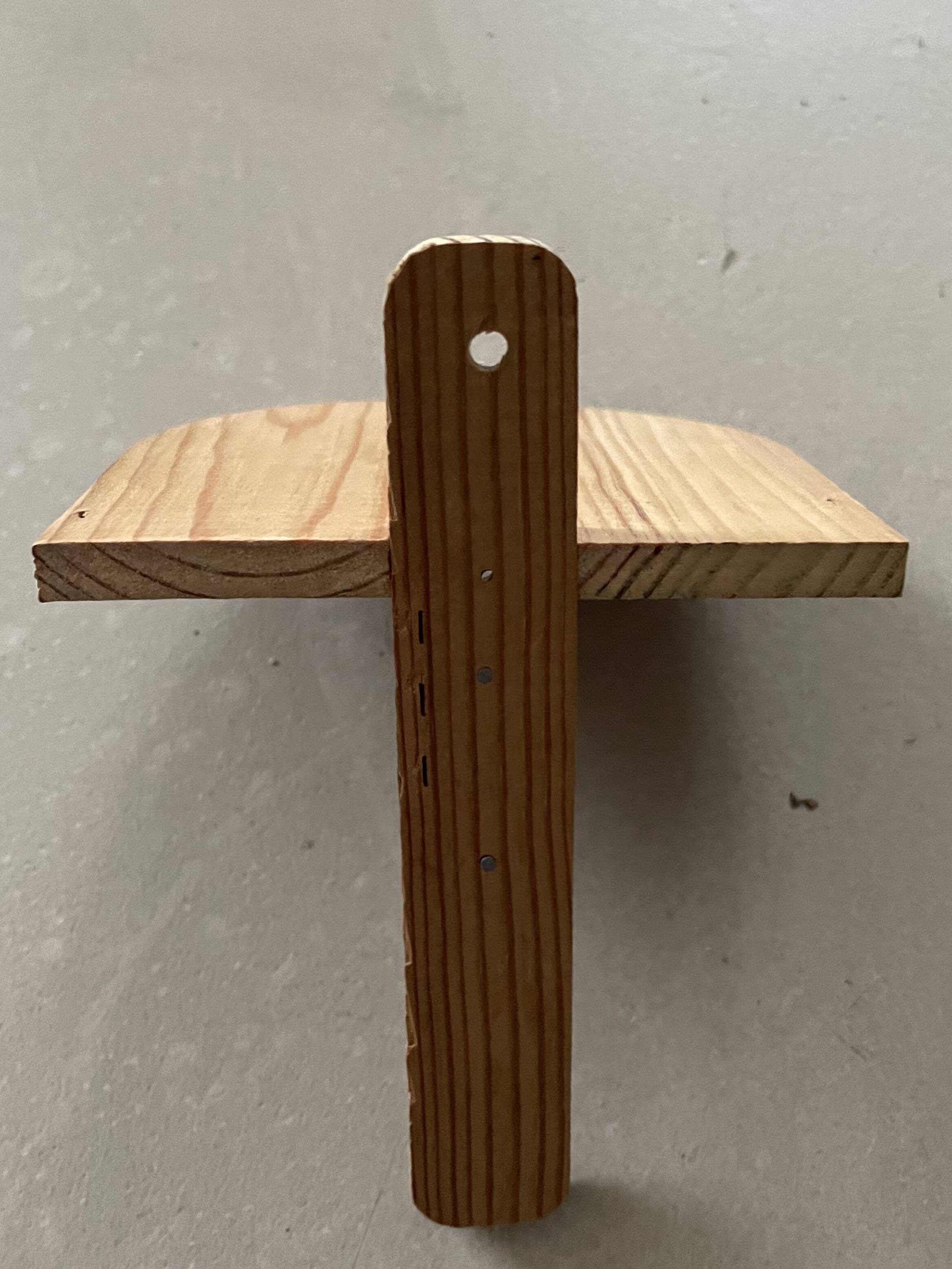 Small wall-mounted wooden shelf