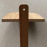 Small wall-mounted wooden shelf