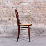 Curved wooden chair and tuna-