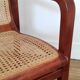 Fauteuil design traineau bois et cannage – années 80