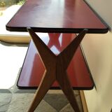 Double-footed red Formica wood spindles console