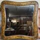 Important rectangular Venetian mirror with a richly painted wooden frame.