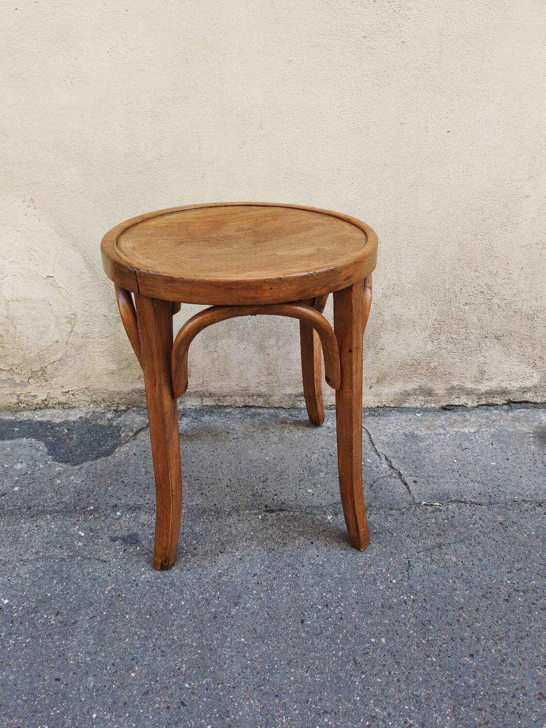 Curved wooden stool