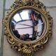 Pair of antique witch mirrors, curved glass, bronze frame