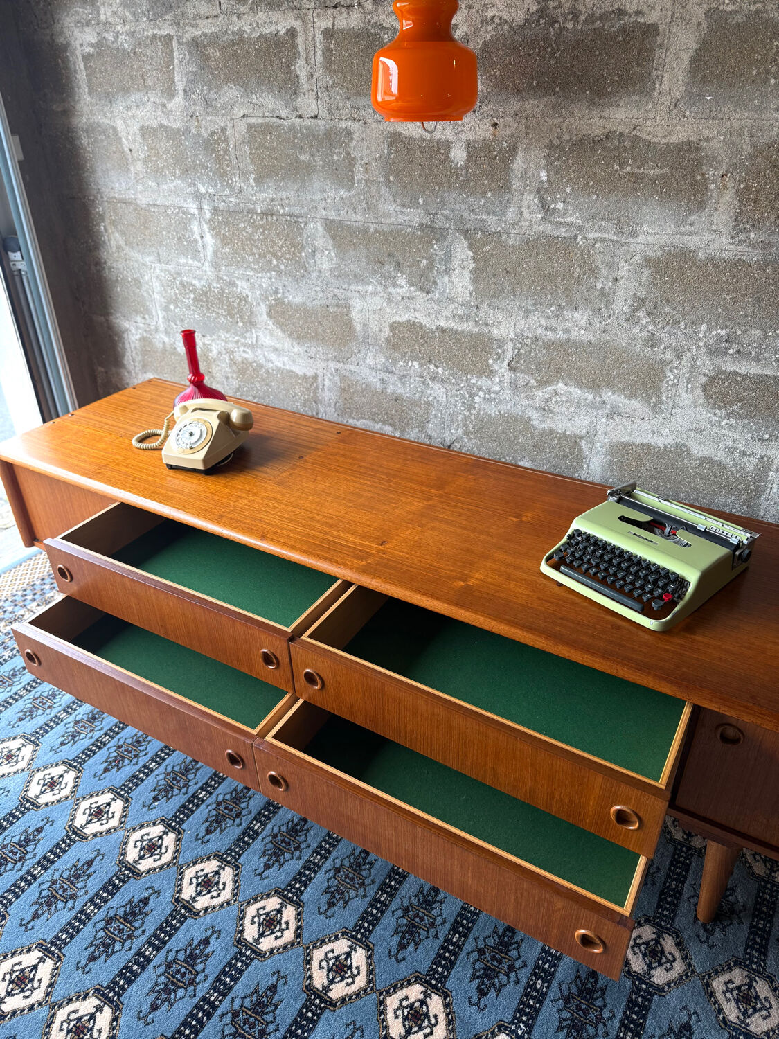 Scandinavian low sideboard in teak, 1970.