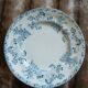 13 mismatched flat plates in ironstone