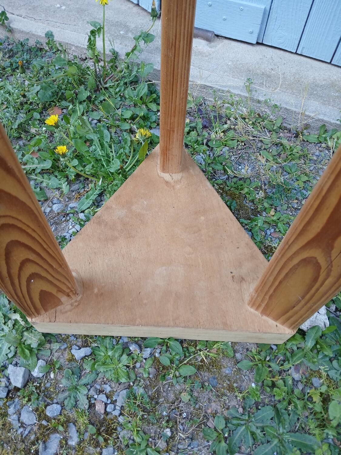 Antique saddle in raw wood and metal