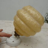 art deco wall light in porcelain and yellow glass