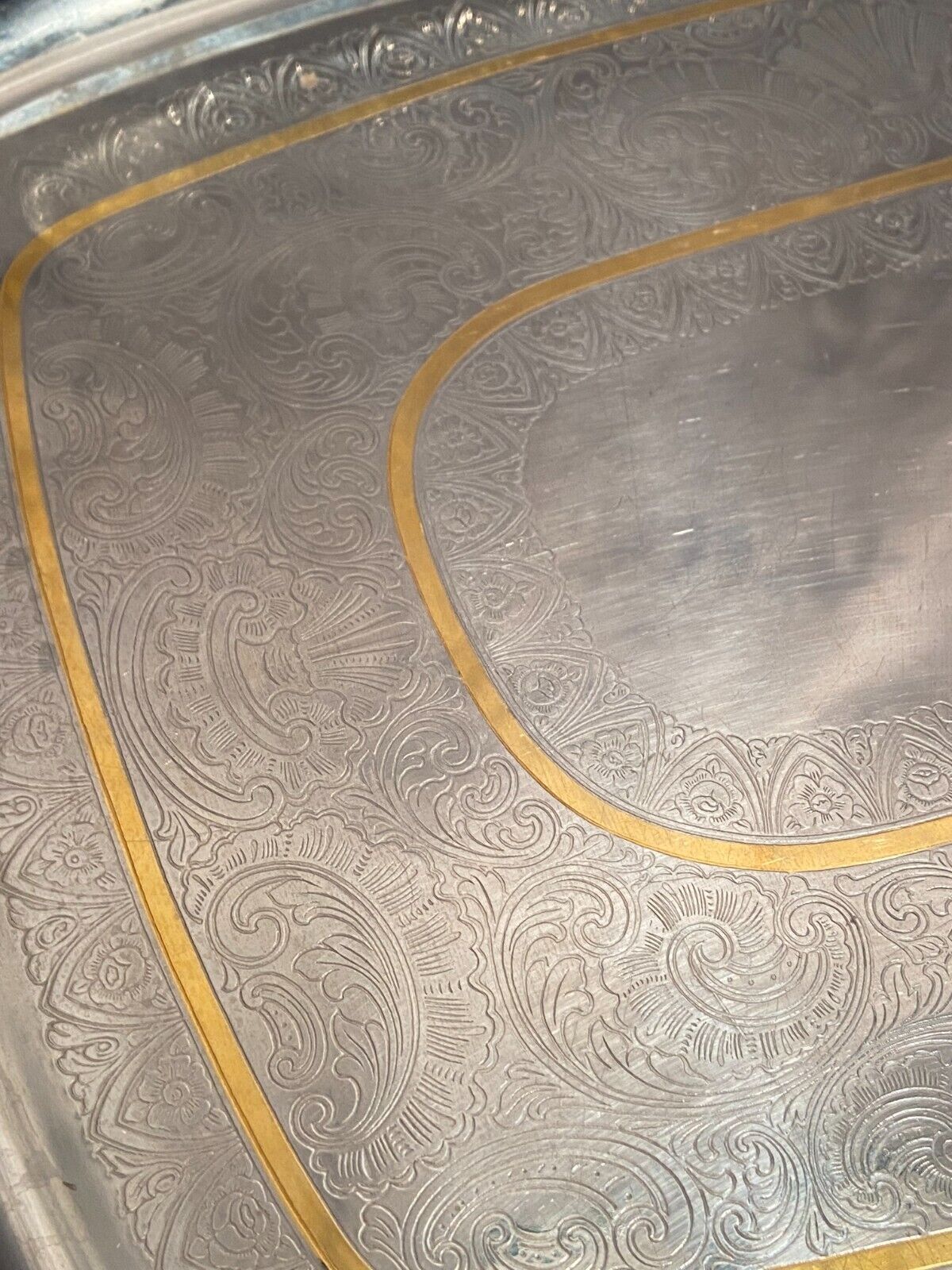 Top with stainless steel handles and gilded Regency style nets