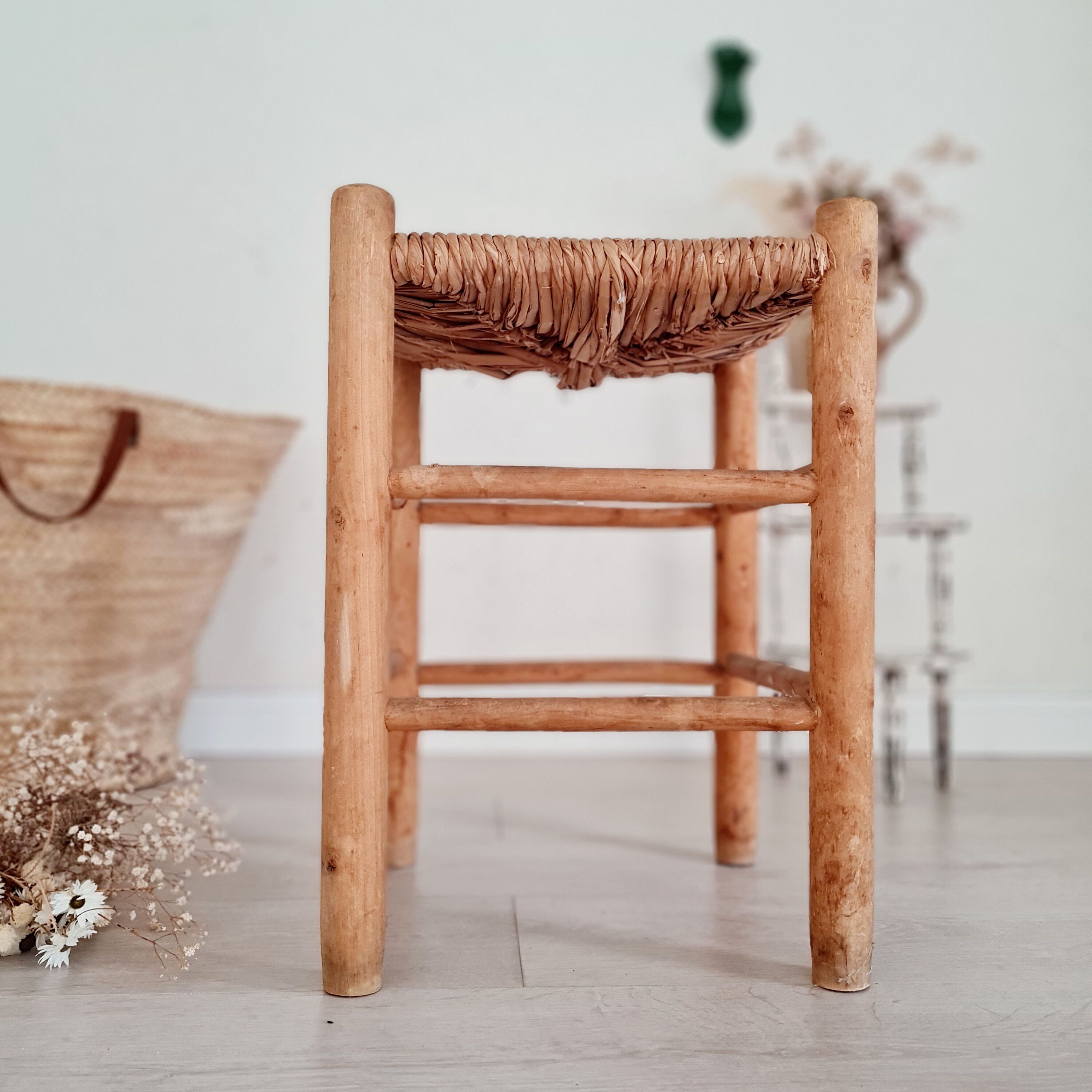 Old stool in wood and straw brutalist look