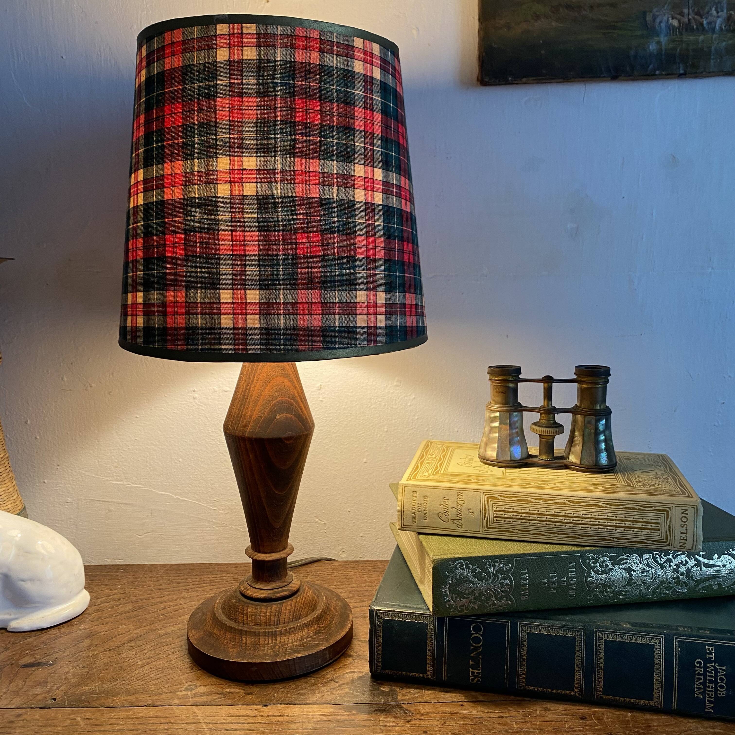 Turned wooden lamp, tartan lampshade.