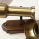 Pair of brass spots and wooden base year 70