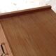 Vintage slanted commode with tapered legs from the 1960s in golden oak.
