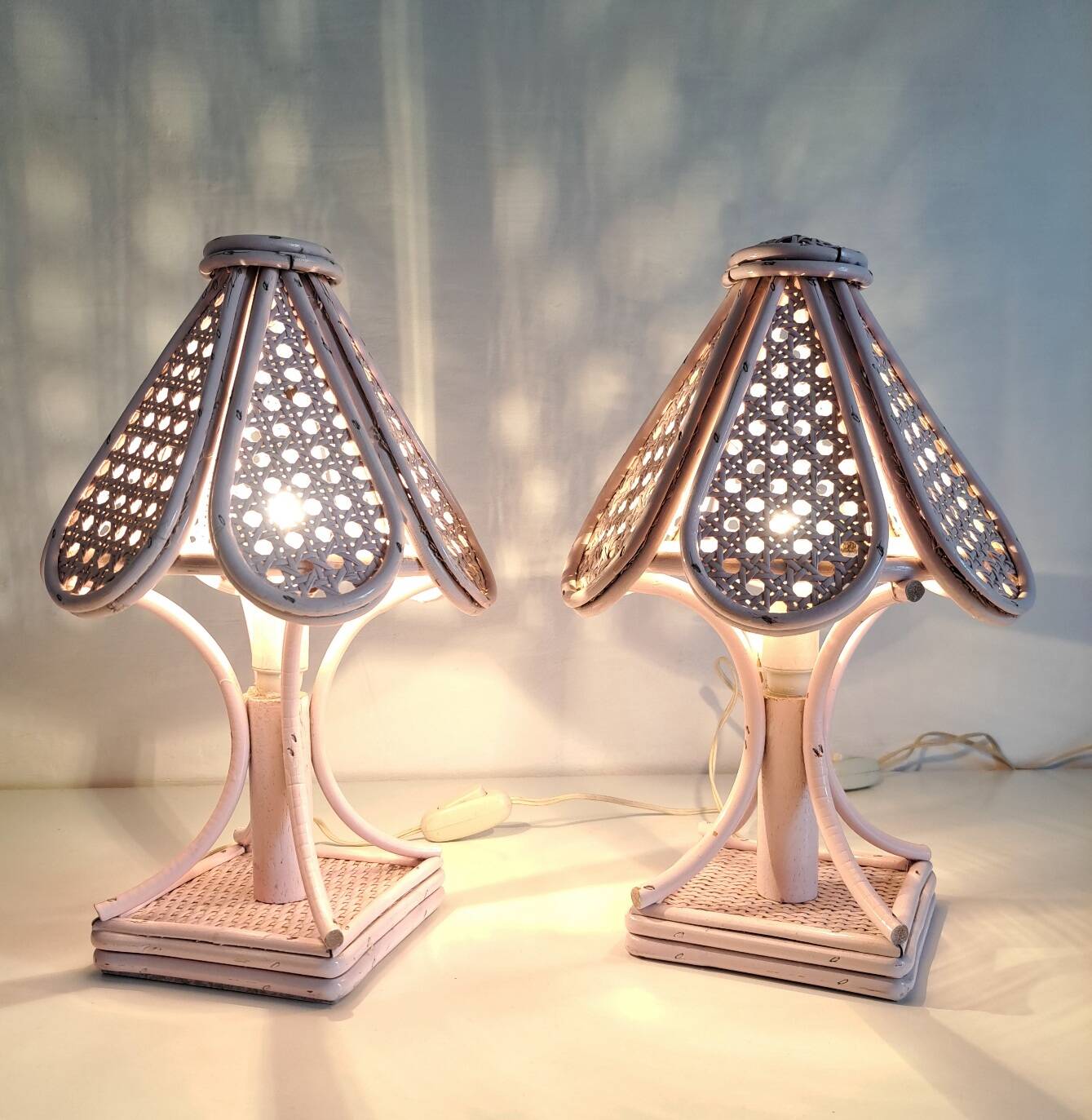 Pair of cane and bamboo bedside lamps