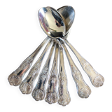 A set of 7 large metal shell spoons