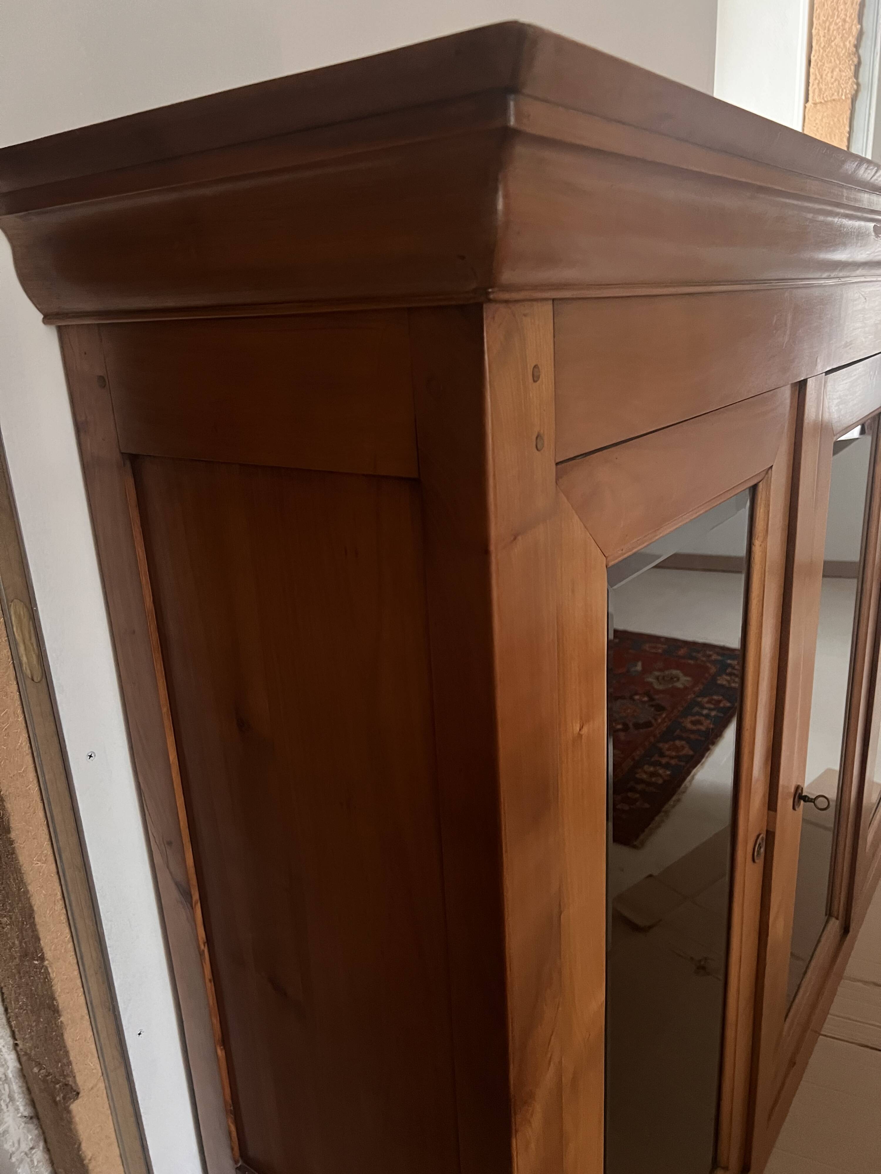 Louis Philippe style solid cherry wood buffet and display cabinet set.