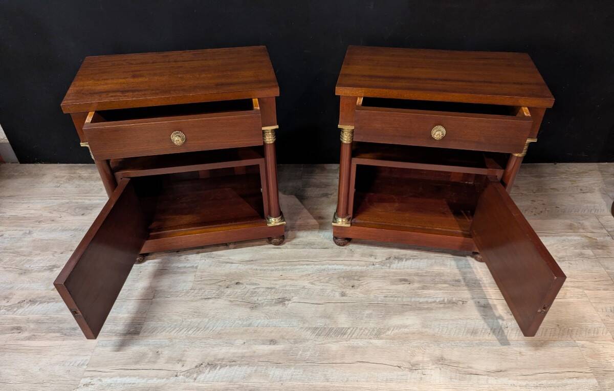 Pair of Empire style bedside tables in mahogany and gilded bronze