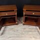 Pair of Empire style bedside tables in mahogany and gilded bronze