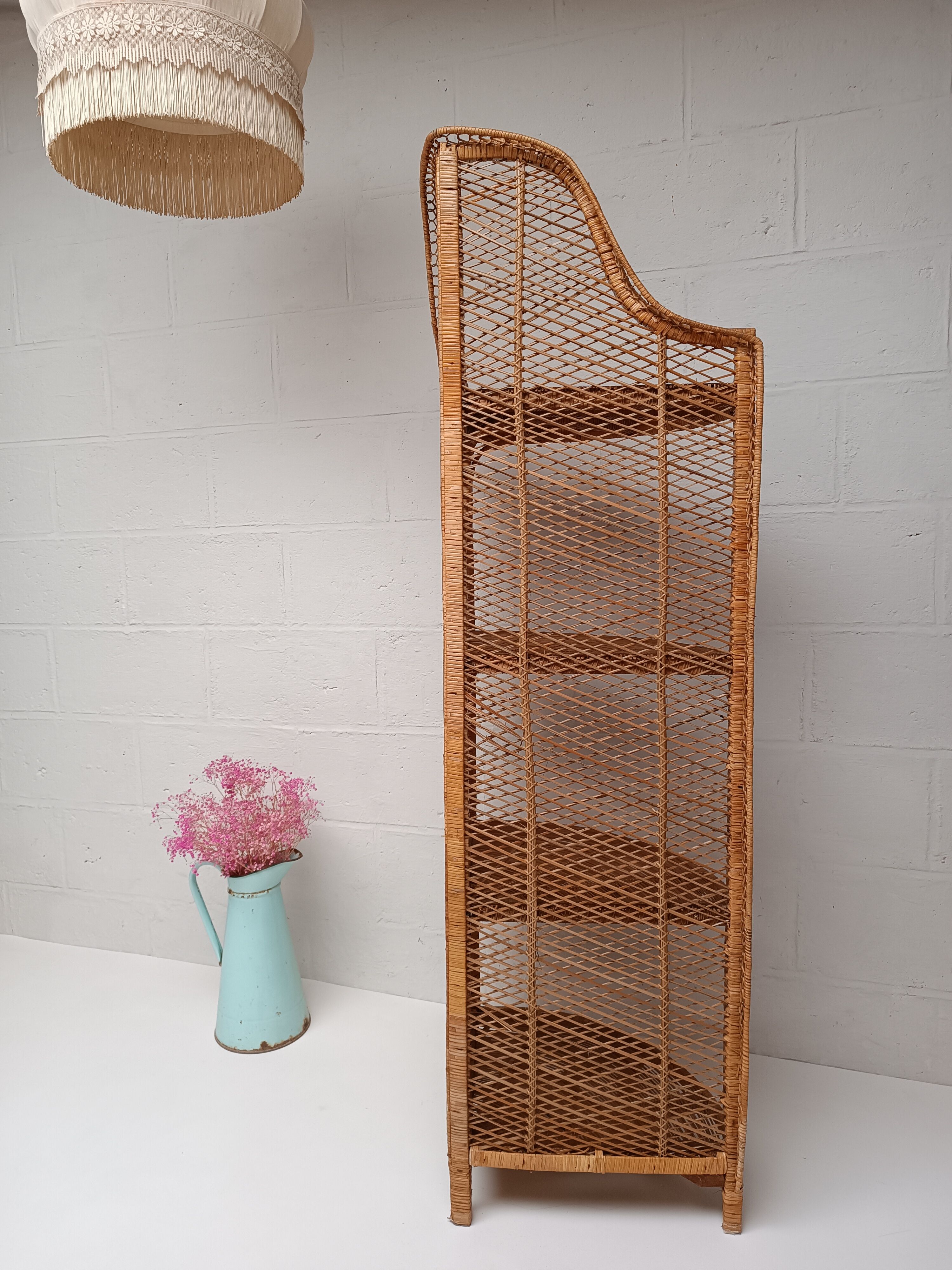 Tall rattan shelf