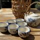 Vintage ceramic tea set for 6 bowls and a teapot.