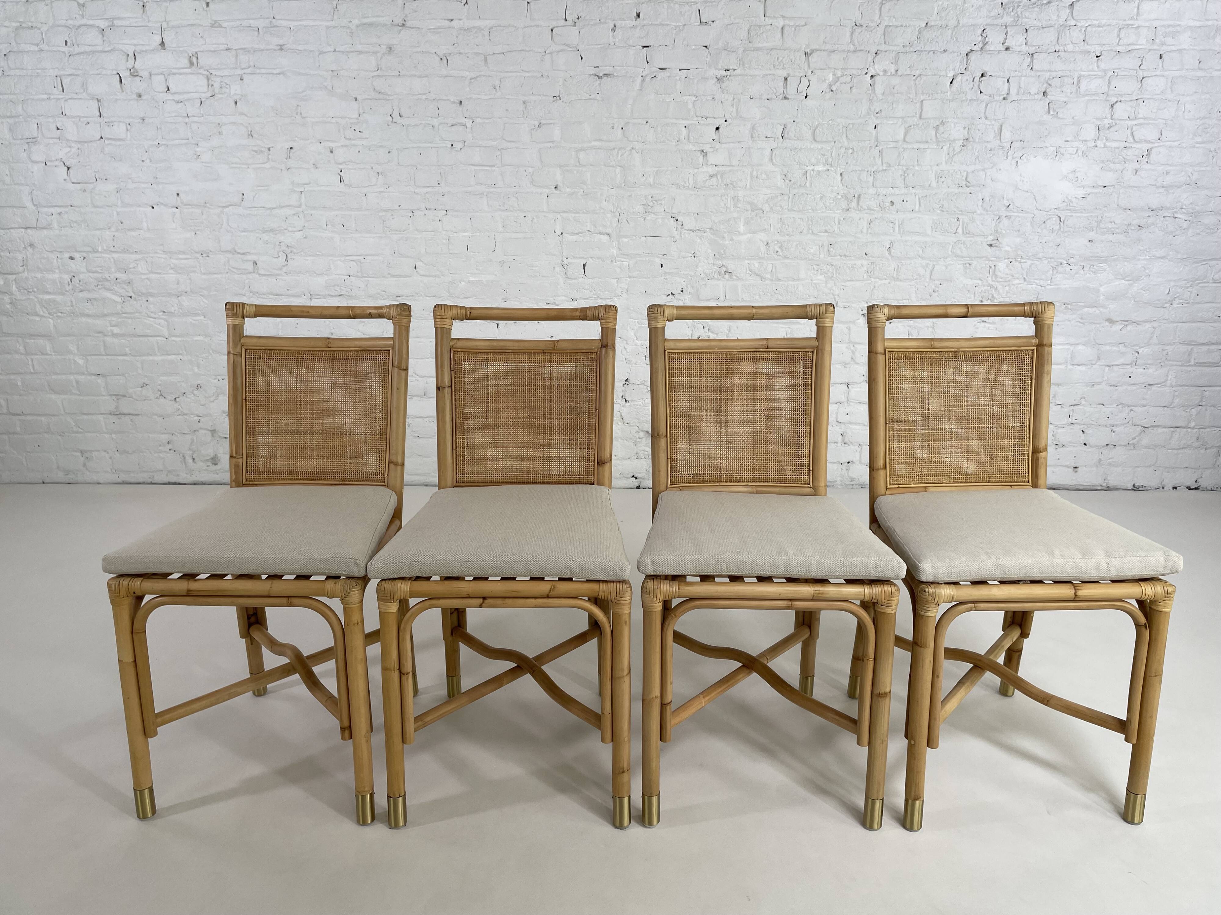 Suite de 4 chaises en rotin cannage et laiton