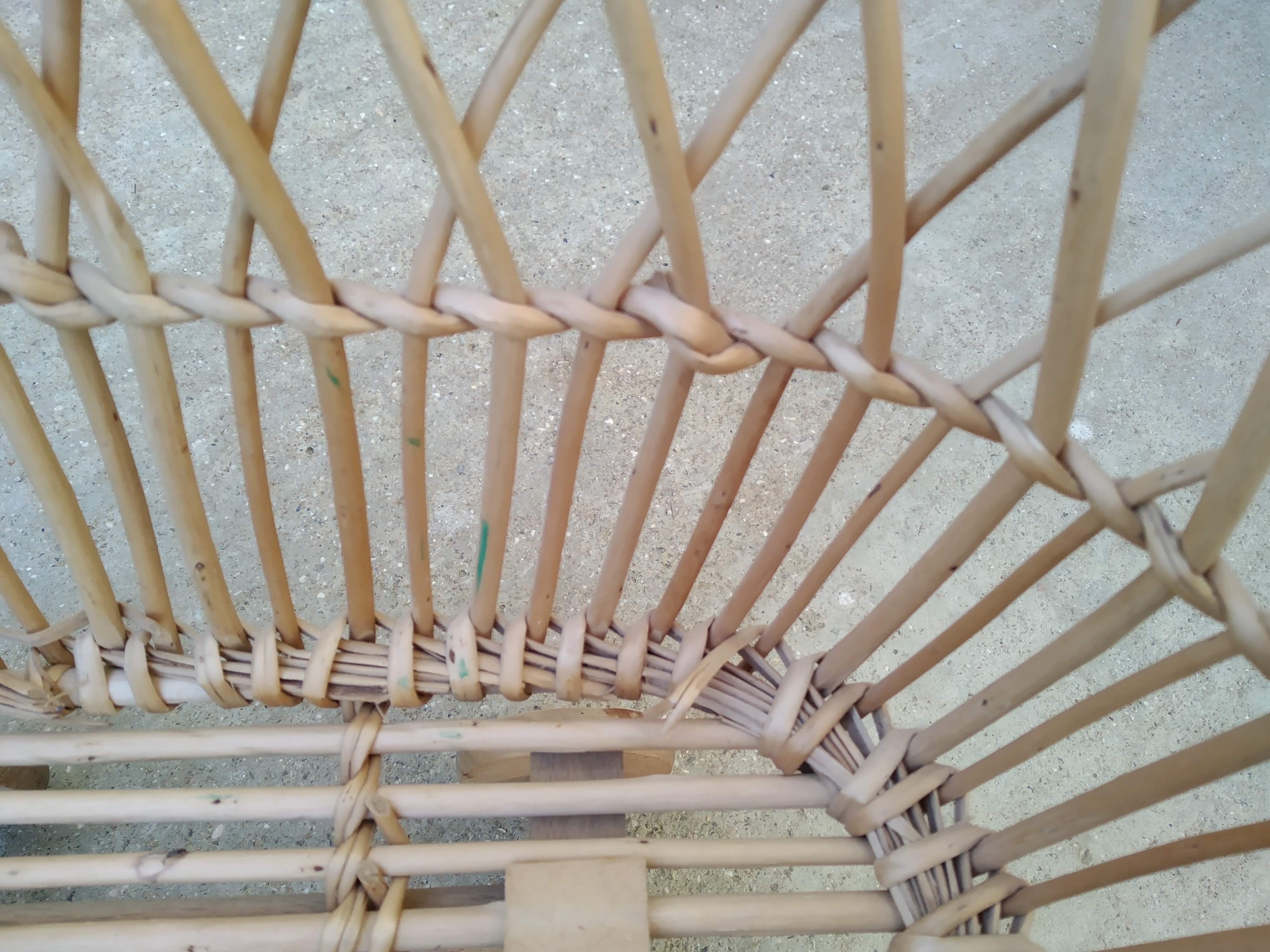 Rattan cradle for doll on vintage wheels