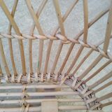 Rattan cradle for doll on vintage wheels