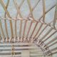 Rattan cradle for doll on vintage wheels