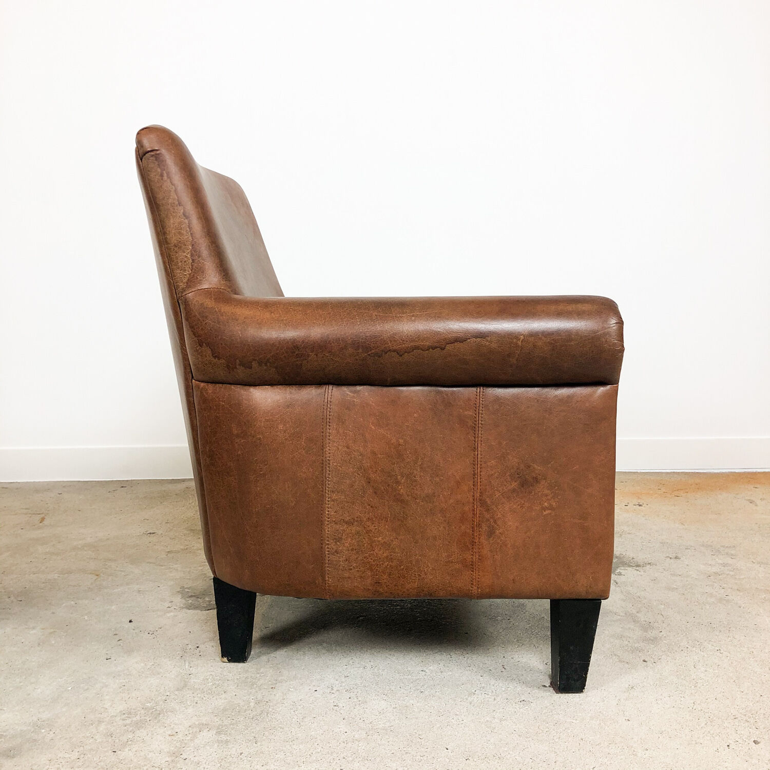 Set of two vintage leather armchairs