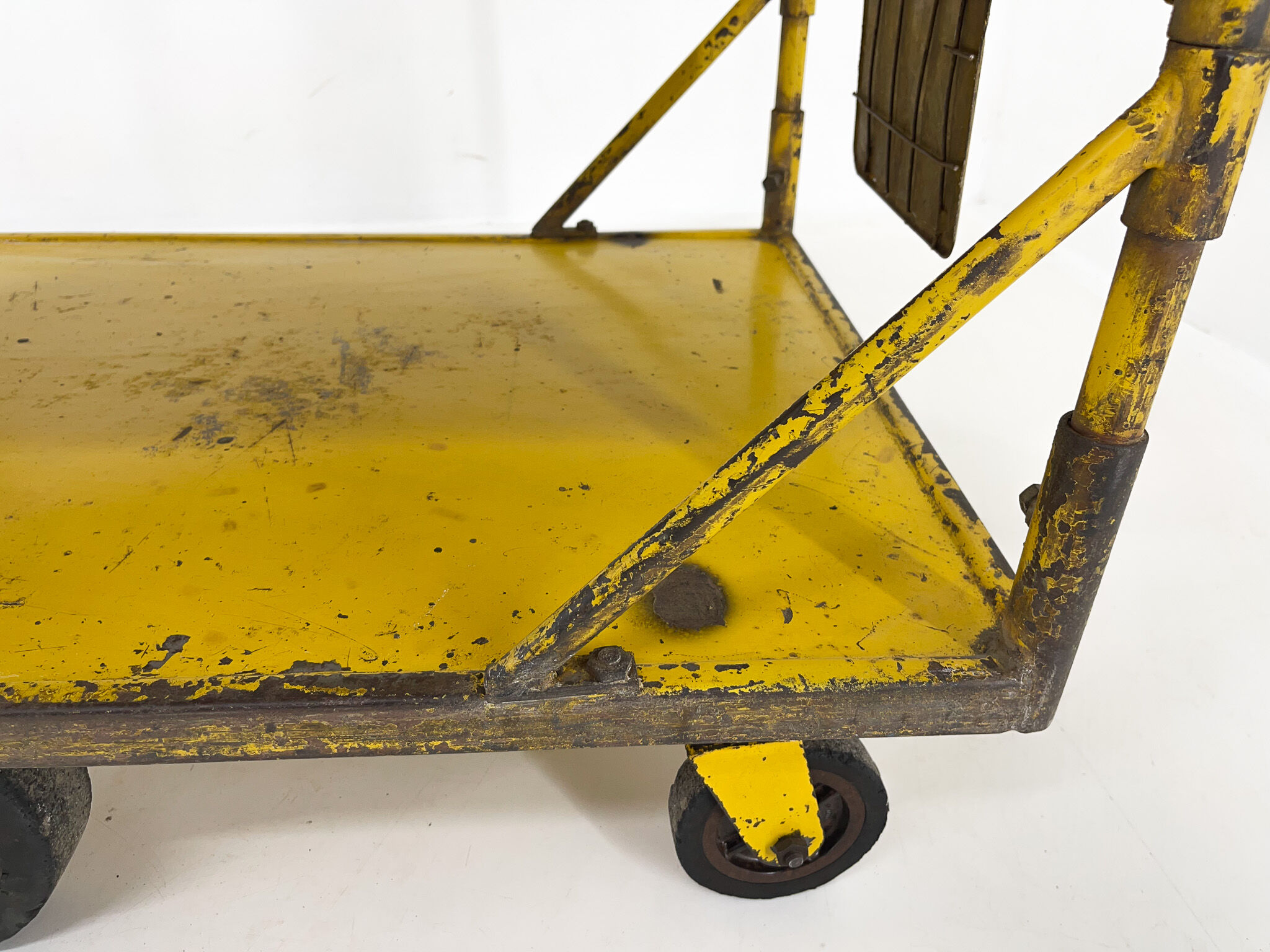 Vintage industrial coffee or side table on wheels