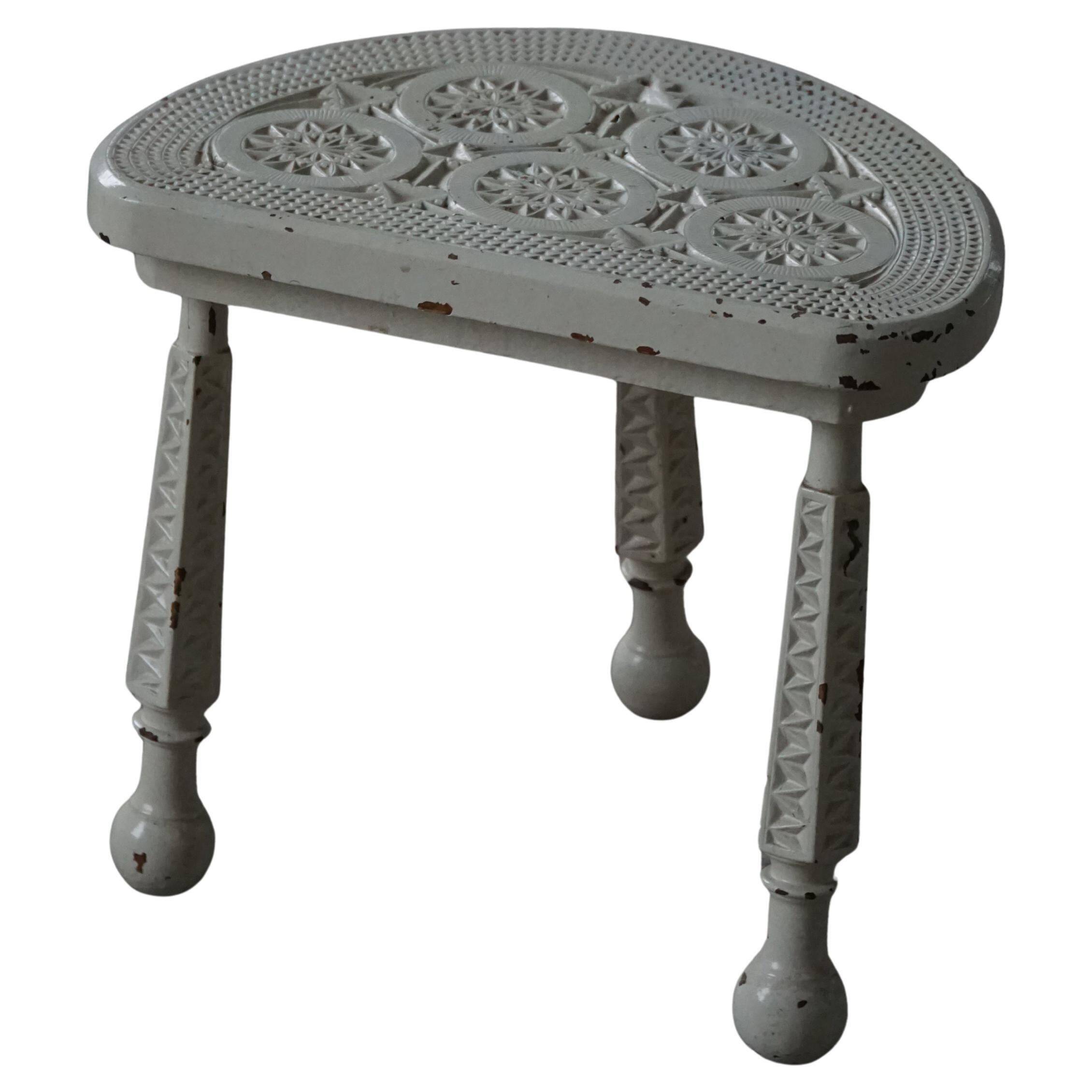 Tripod wooden stool with carved details, early 20th century Danish, 1930s.