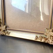Antique wooden frame with metal gold colored details 28 cm x 22 cm convex glass