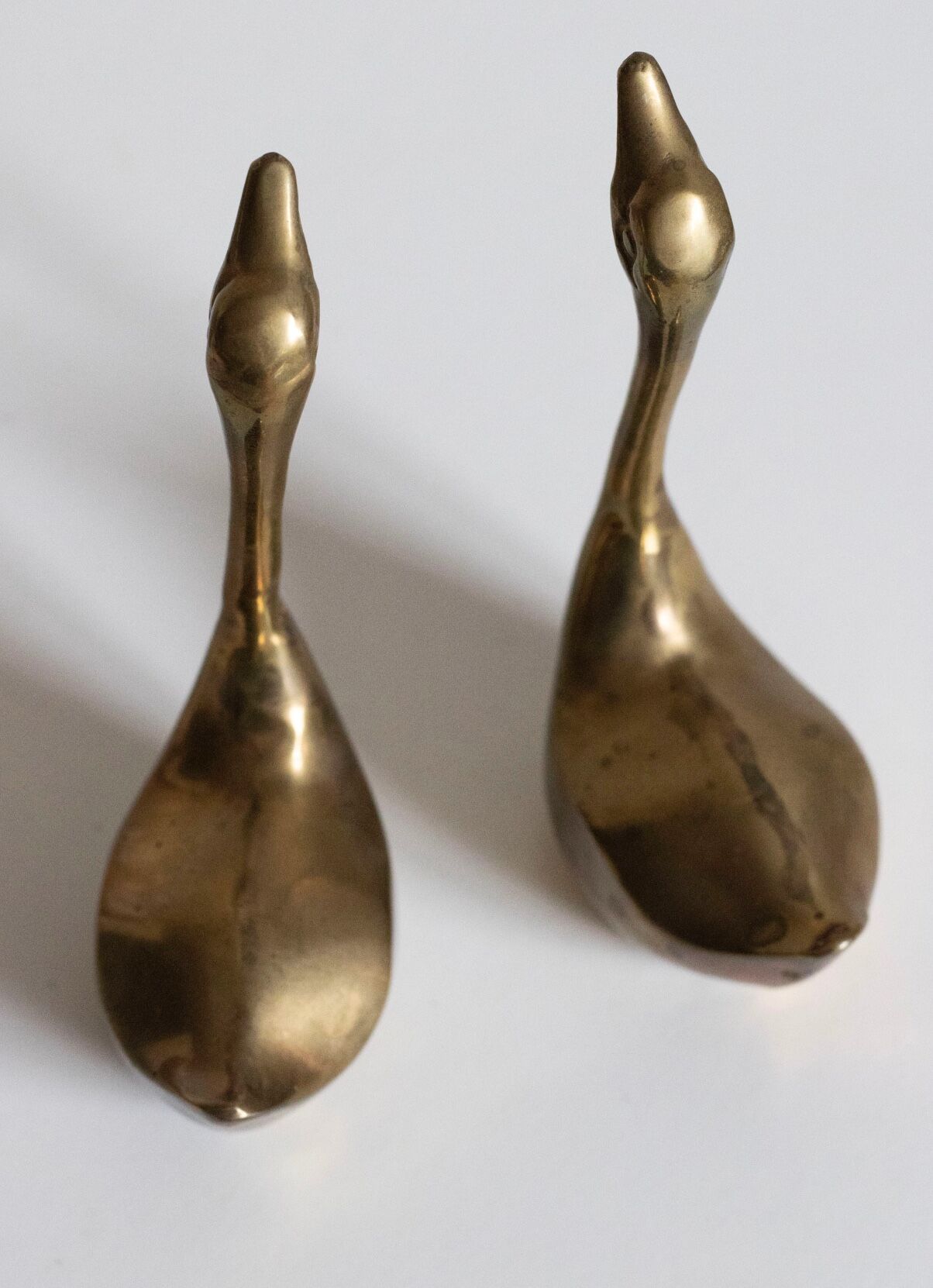 Pair of vintage brass swans