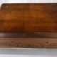 19th-century carved walnut desk with a leather top.