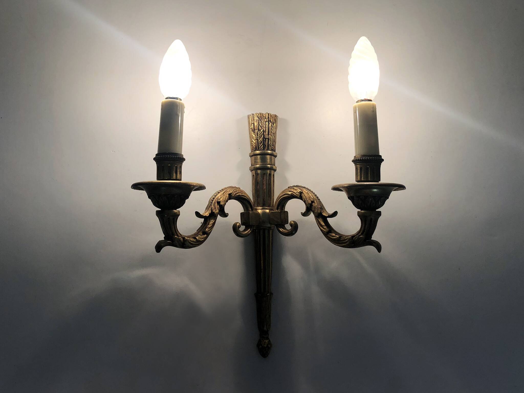 Empire-style wall lamp with double lights in bronze from the 1960s.