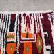 Handwoven Moroccan rug, natural wool, 250cm x 150cm, elegant decoration.