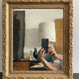 Old small baroque mirror with mercury tin