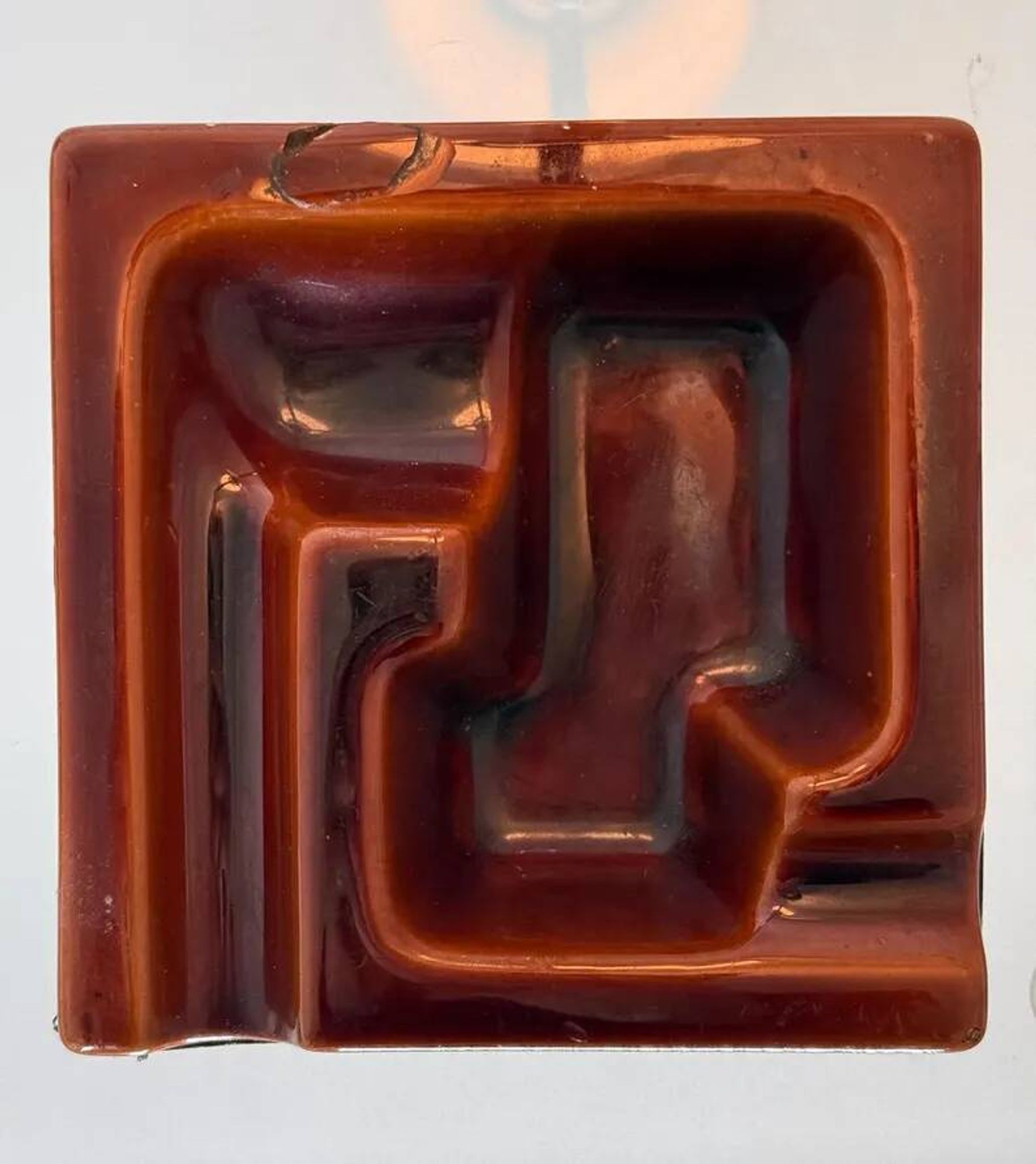 Geometric brown enamelled ashtray with a leather base (1960s-70s)
