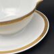 Limoges porcelain gravy boat with gold edging