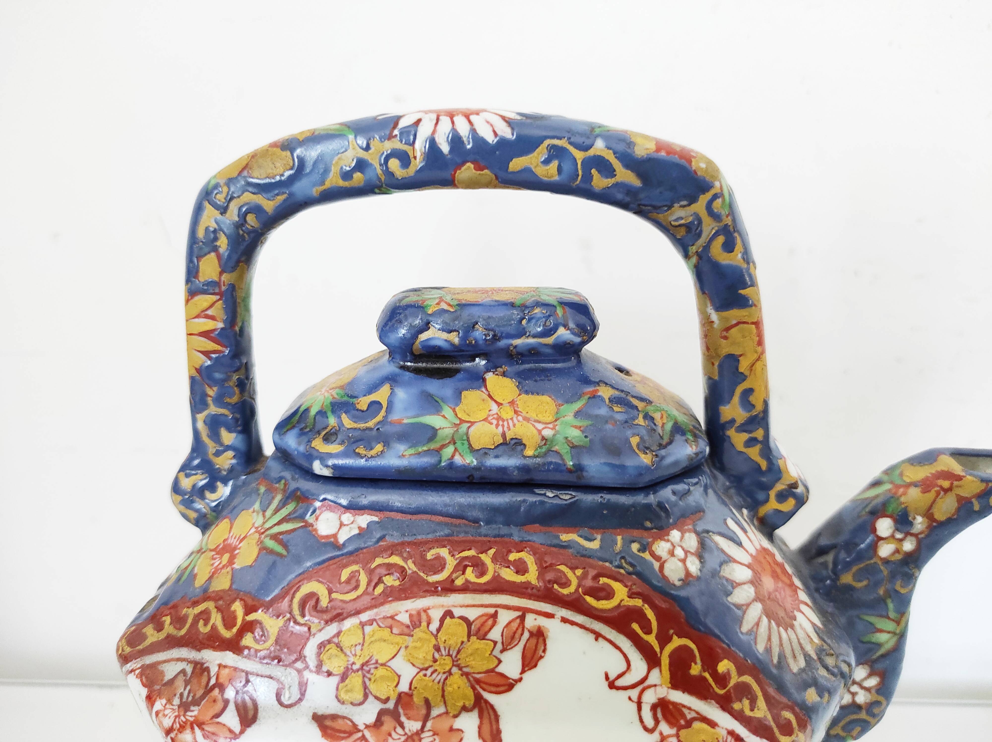 Japanese porcelain teapot with geisha decor