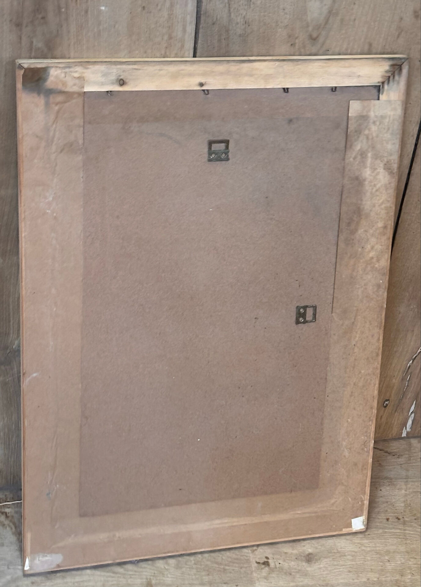 Pair of vintage antique mirrors in raw solid wood.