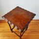 Antique solid oak side table with turned wooden legs.
