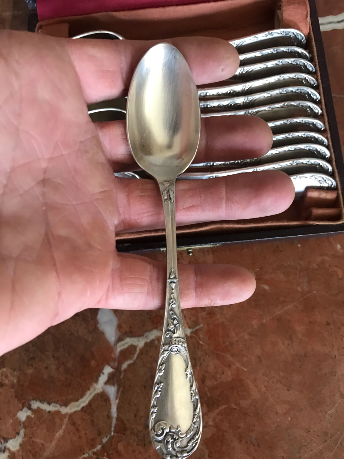 Series of 12 small silver metal spoons