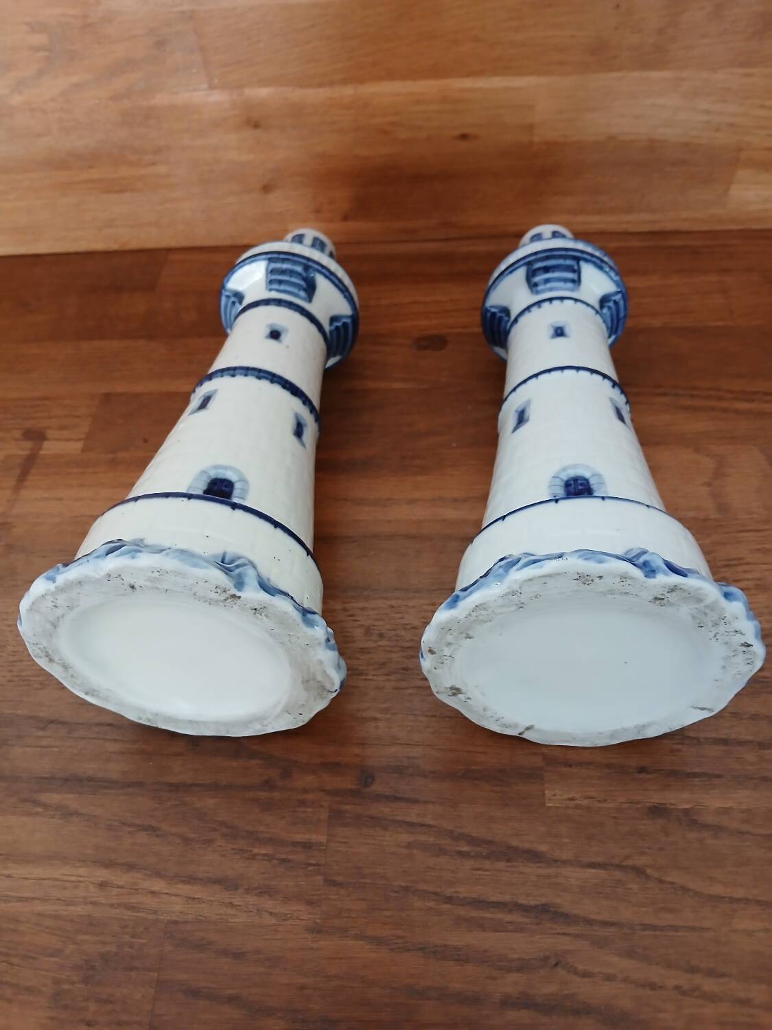 Pair of lighthouse-shaped candle holders