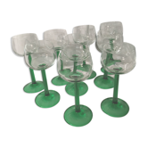 9 glasses of white wine (green feet)