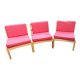 Set of 3 vintage armchairs from the 60s/70s – light wood and red faux leather.