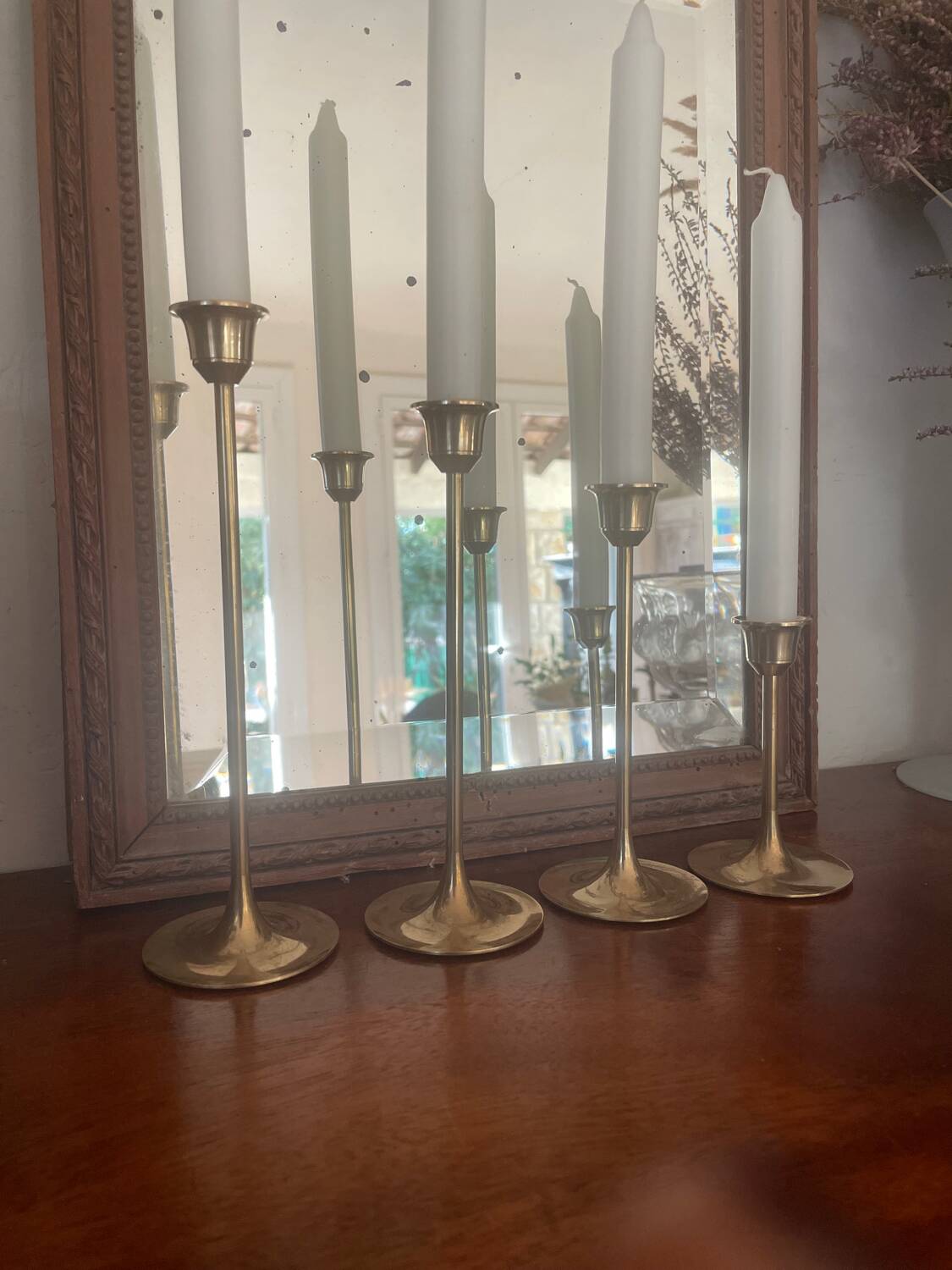 Set of 4 Scandinavian brass candlesticks