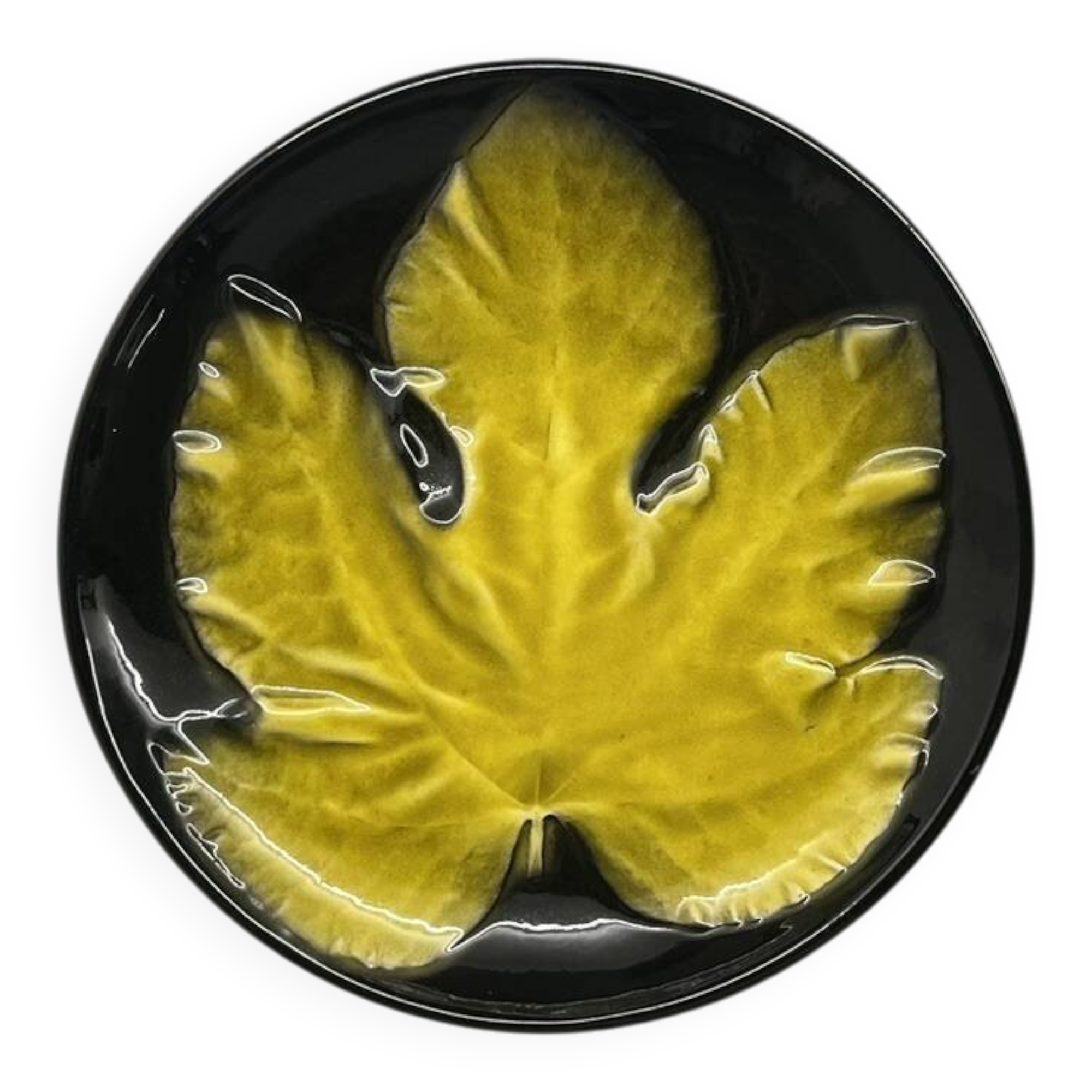 Wall plate by Pol Chambost with leaf pattern.